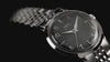 Timex Marlin Quartz with a polished stainless steel case, stainless steel bracelet, black sunray dial, luminous hands, and vintage-inspired design through rotating product views and close-up details.